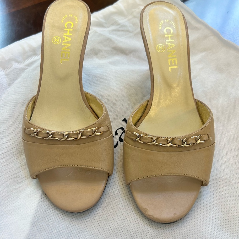 CHANEL Tan Leather Mules with Gold Chain Detail